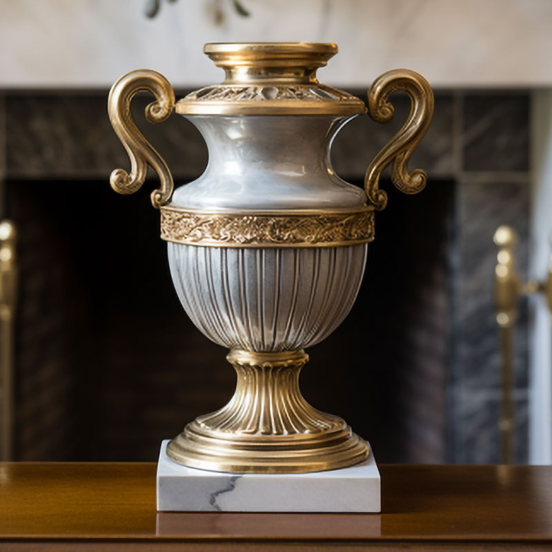 Silver-and-gold-Urn-on-a-mantle-2