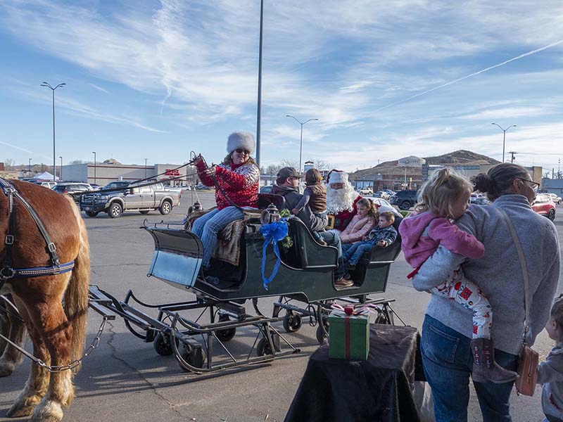 Santa gives sleigh rides in Ace Parking Lot 12-21-2024_006