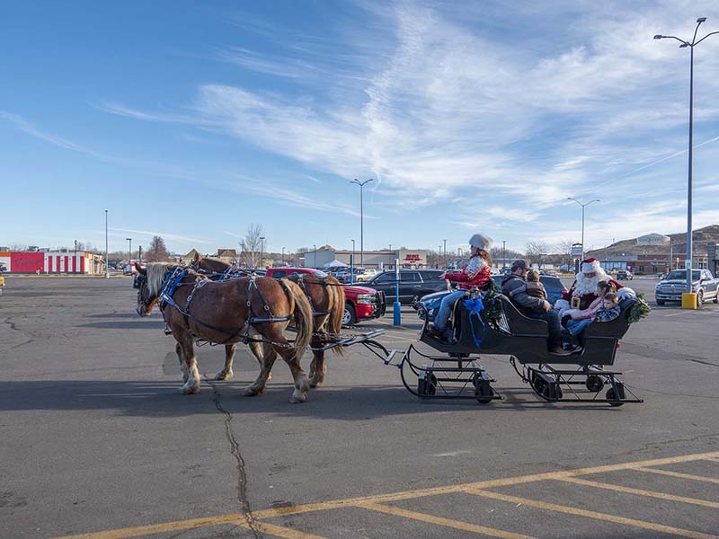 Santa gives sleigh rides in Ace Parking Lot 12-21-2024_008