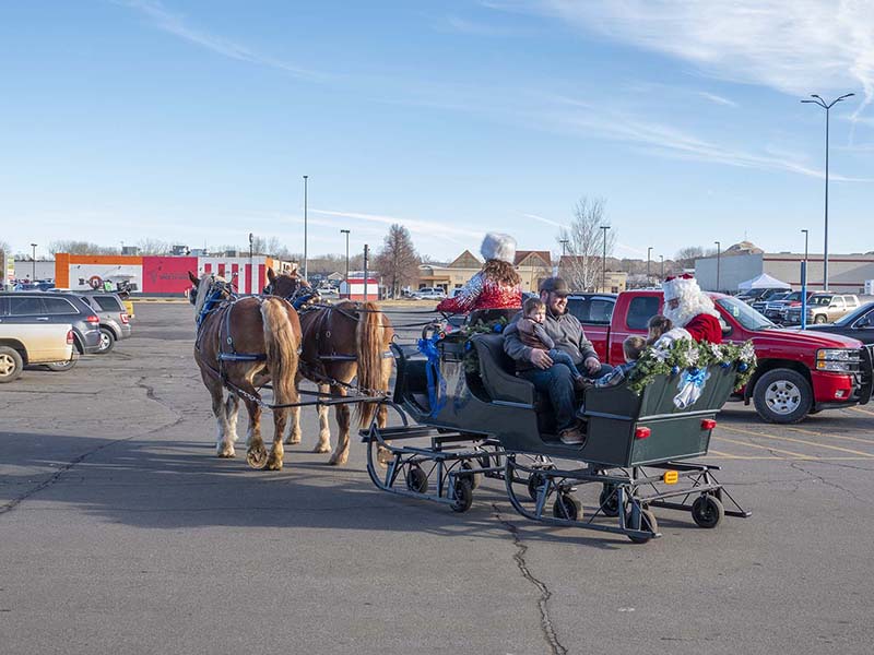 Santa gives sleigh rides in Ace Parking Lot 12-21-2024_009