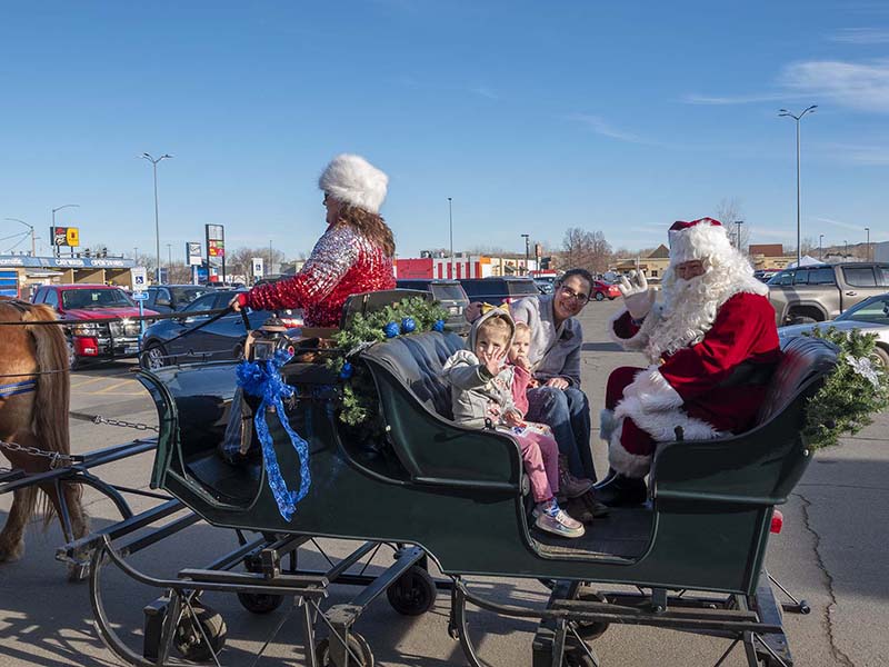 Santa gives sleigh rides in Ace Parking Lot 12-21-2024_016