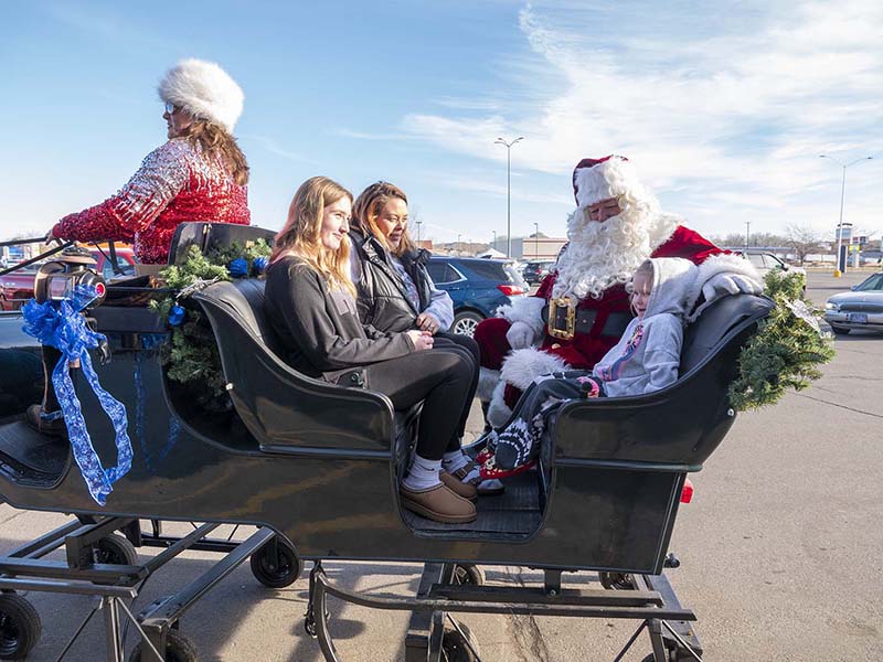 Santa gives sleigh rides in Ace Parking Lot 12-21-2024_024